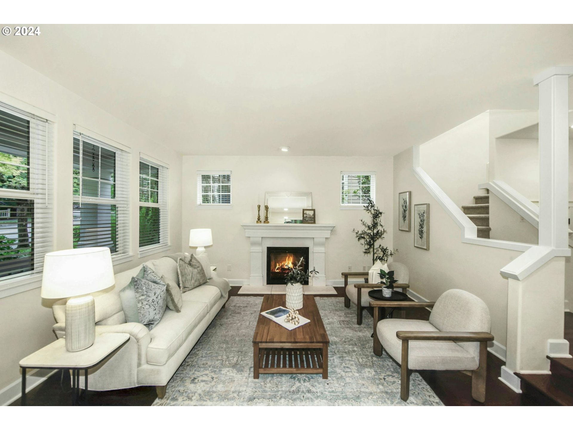 2324 Northwest Miller Road Portland, OR 97229 - Photo 6 of 29 a living room with furniture a fireplace and a large window