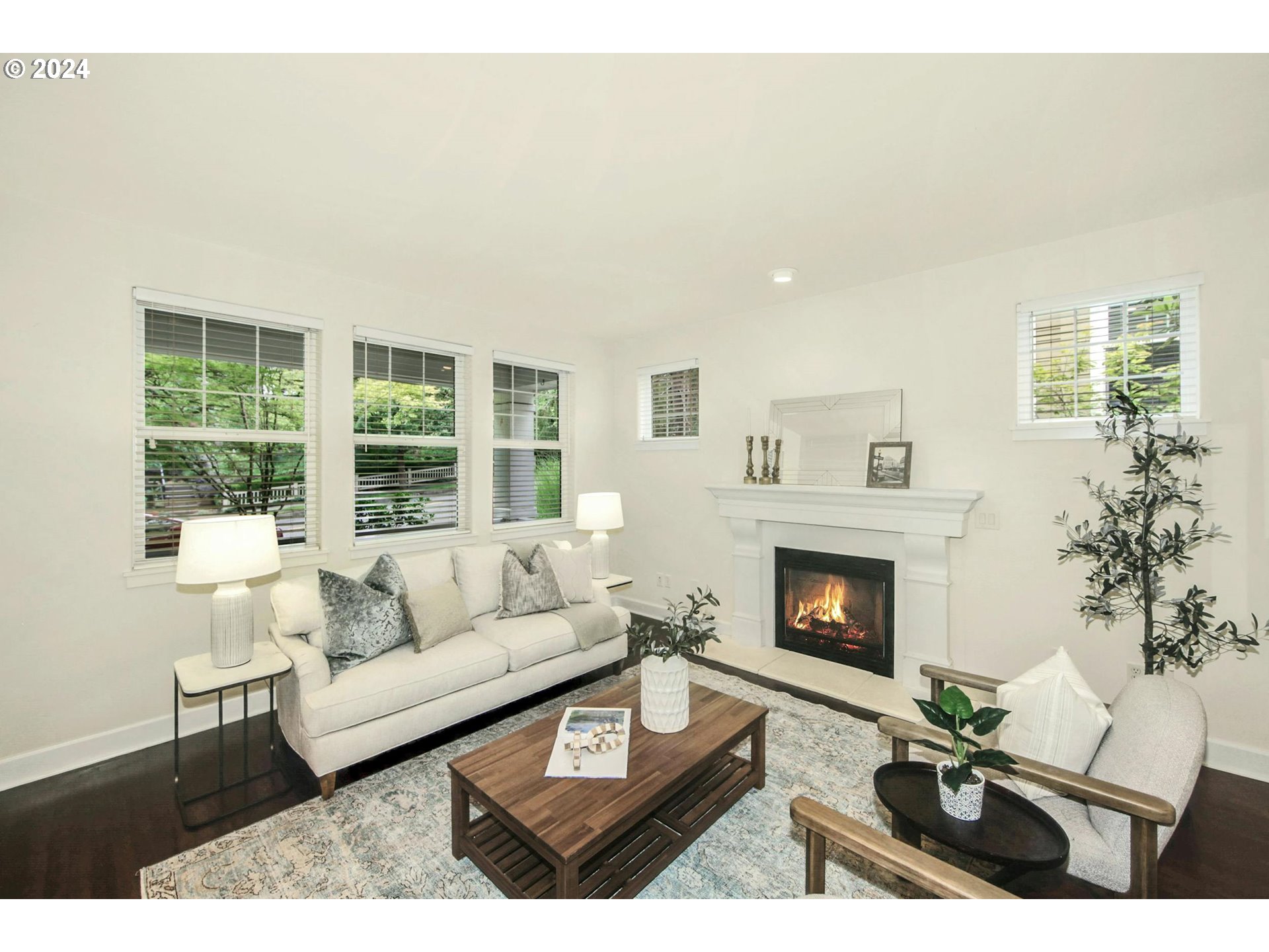 2324 Northwest Miller Road Portland, OR 97229 - Photo 7 of 29 a living room with furniture and a fireplace