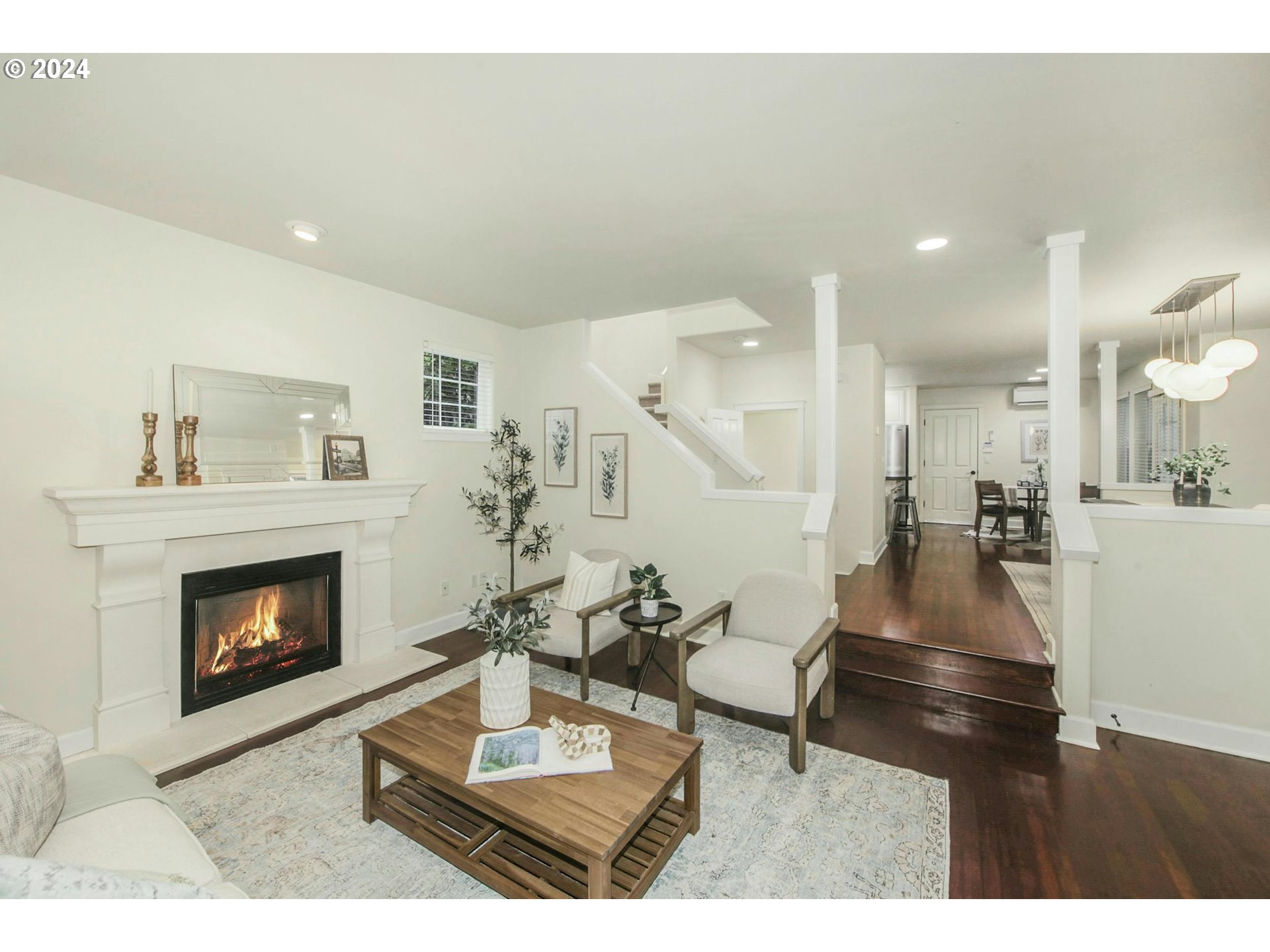 2324 Northwest Miller Road Portland, OR 97229 - Photo 8 of 29 a living room with furniture and a fireplace