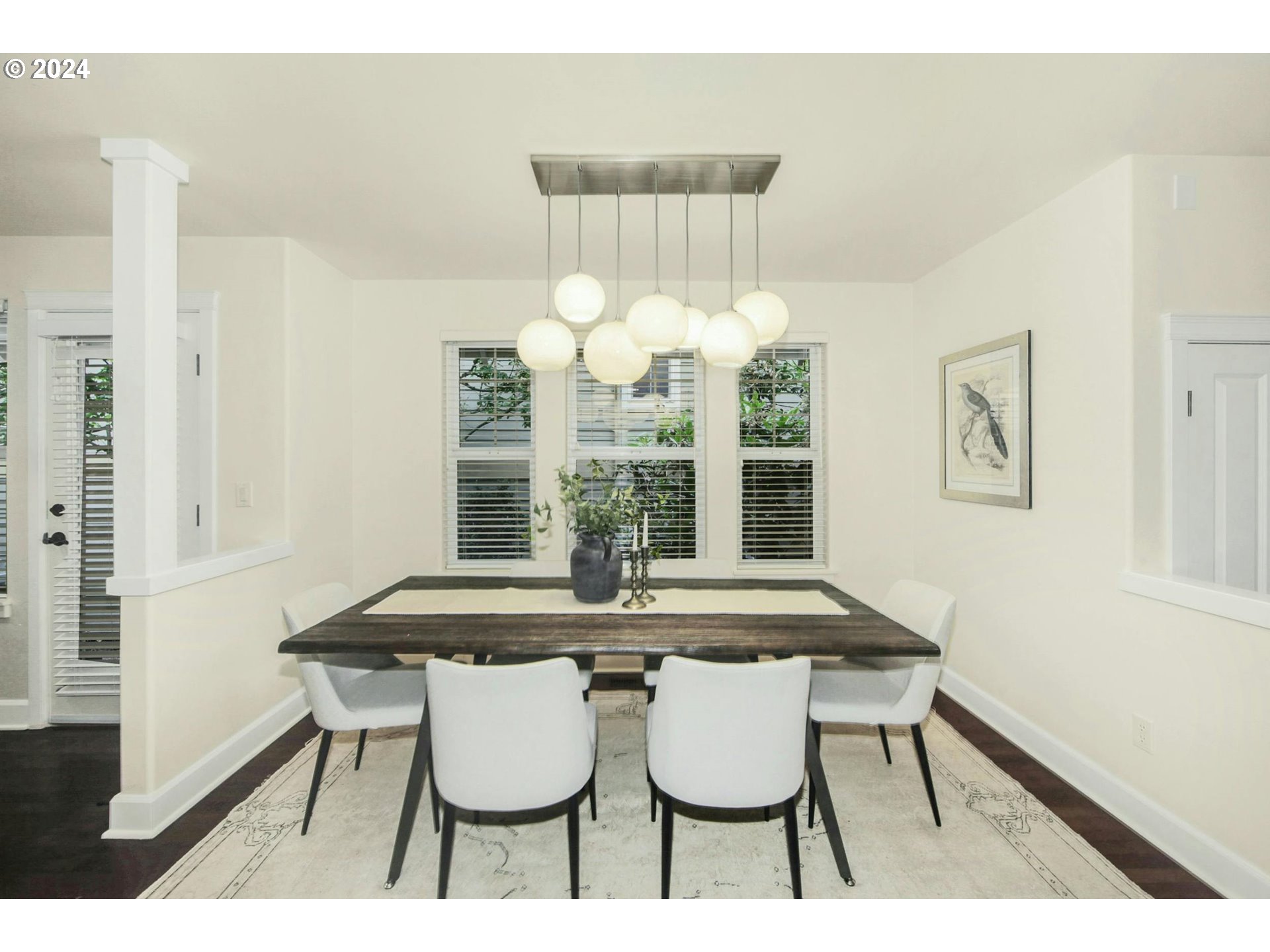 2324 Northwest Miller Road Portland, OR 97229 - Photo 9 of 29 a view of a dining room with furniture and chandelier