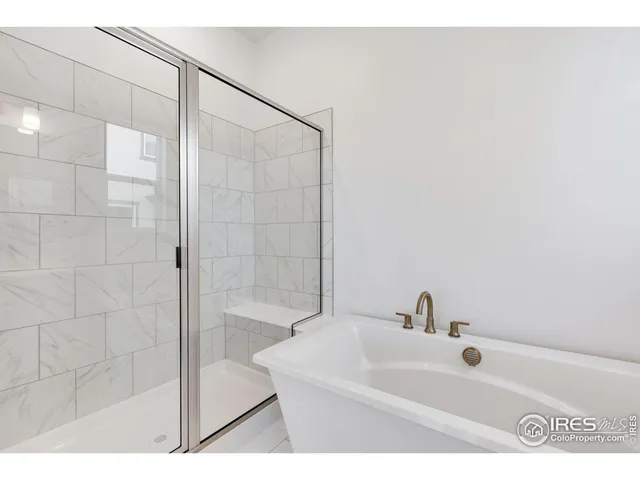 a bathroom with a sink and a shower