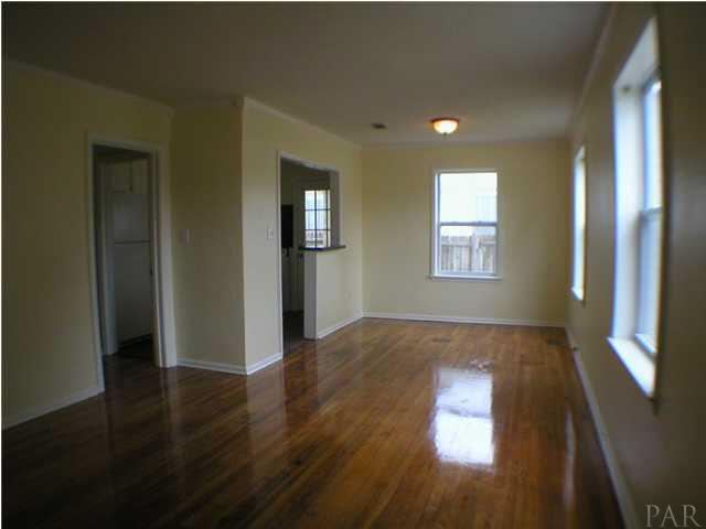 218 Bryant Road Pensacola, FL 32507 - Photo 2 of 13 Living/dining area - CHECK OUT THAT HARWOOD FLOORING!