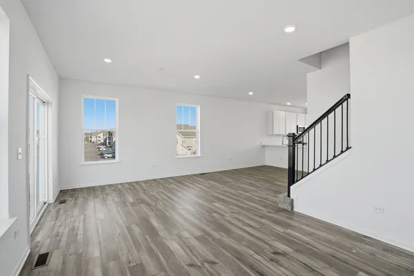 a view of entryway with wooden floor
