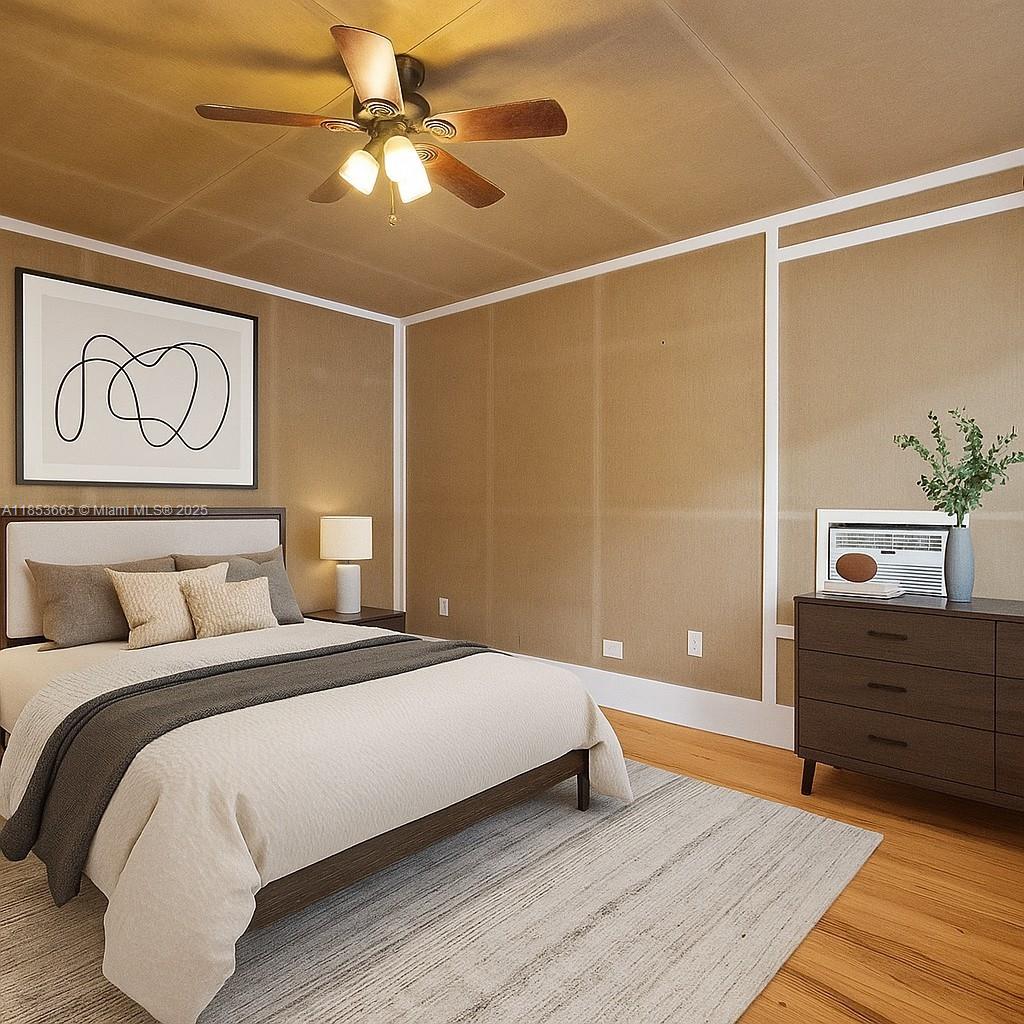 1721 Southwest 21st Terrace, Unit 1719 Miami, FL 33145 - Photo 16 of 25 a bedroom with a bed and a chandelier