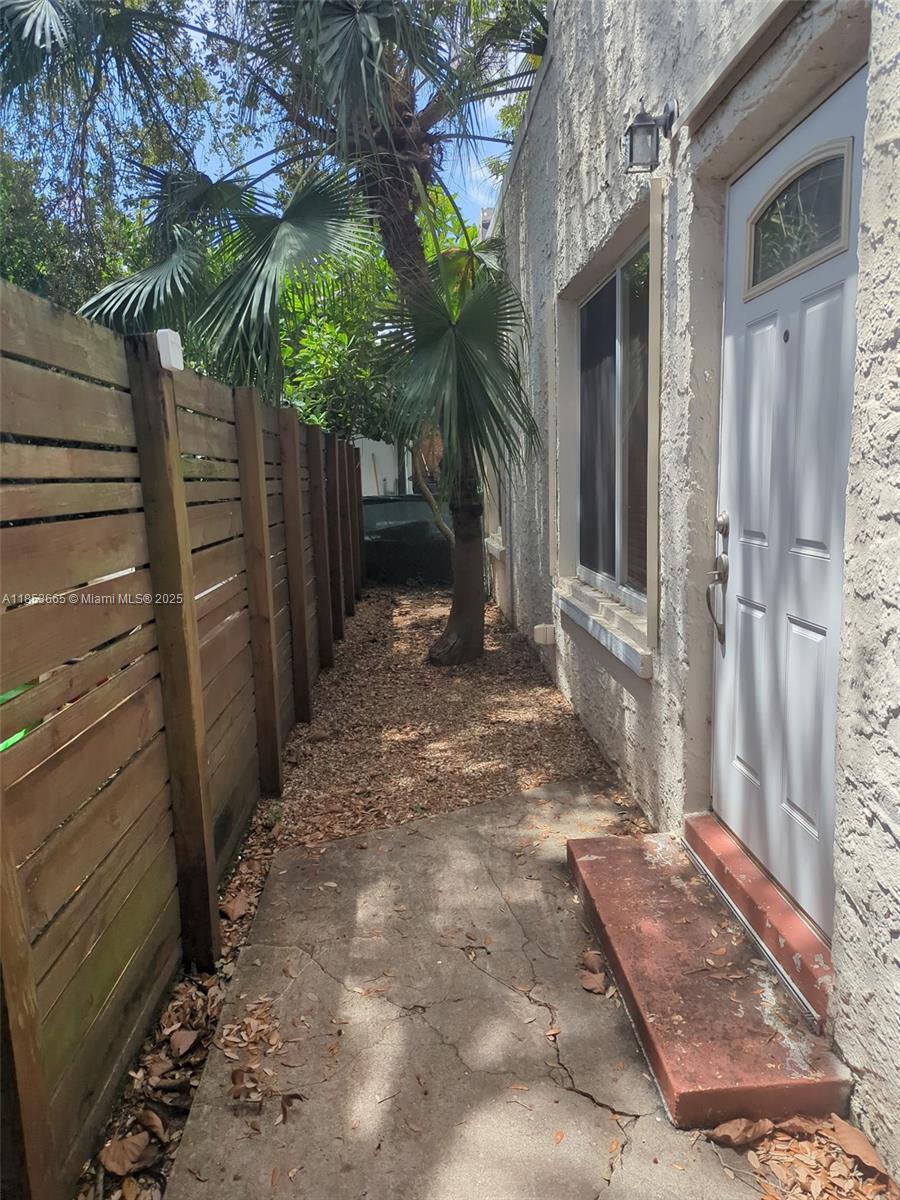1721 Southwest 21st Terrace, Unit 1719 Miami, FL 33145 - Photo 25 of 25 a view of path along with trees