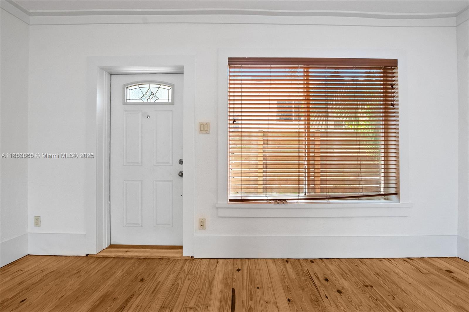 1721 Southwest 21st Terrace, Unit 1719 Miami, FL 33145 - Photo 8 of 25 a view of a room that has a window in it