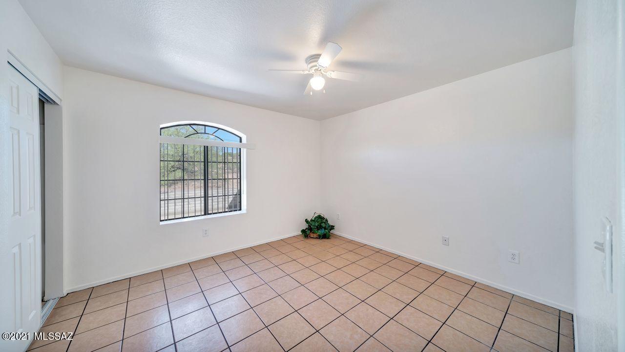 999 Circulo Golondrina Rio Rico, AZ 85648 - Photo 12 of 36 a view of an empty room and window