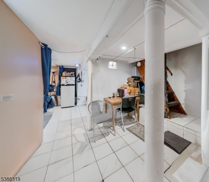 643 Elizabeth Avenue Elizabeth Port, NJ 07206 - Photo 33 of 36 a living room with furniture