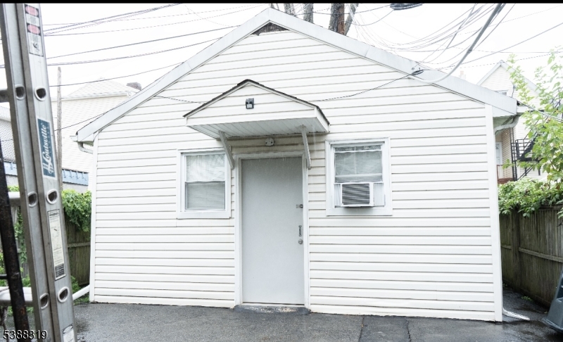 643 Elizabeth Avenue Elizabeth Port, NJ 07206 - Photo 10 of 36 a view of a white house