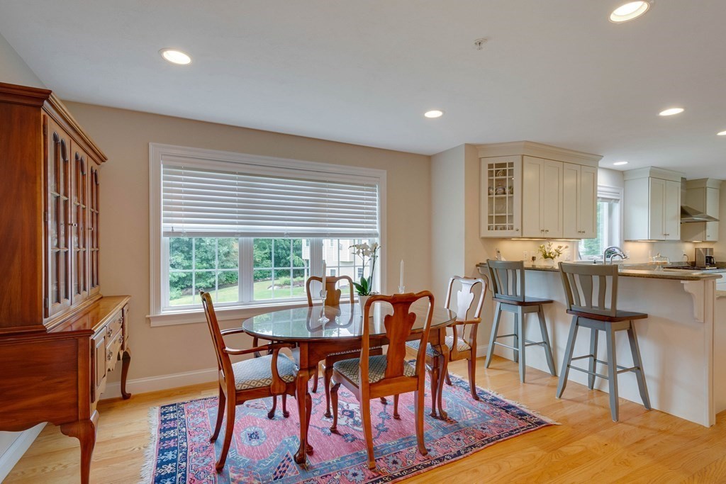 1138 Hill Road, Unit 4B Boxborough, MA 01719 - Photo 12 of 41 a view of a dining room with furniture window and outside view