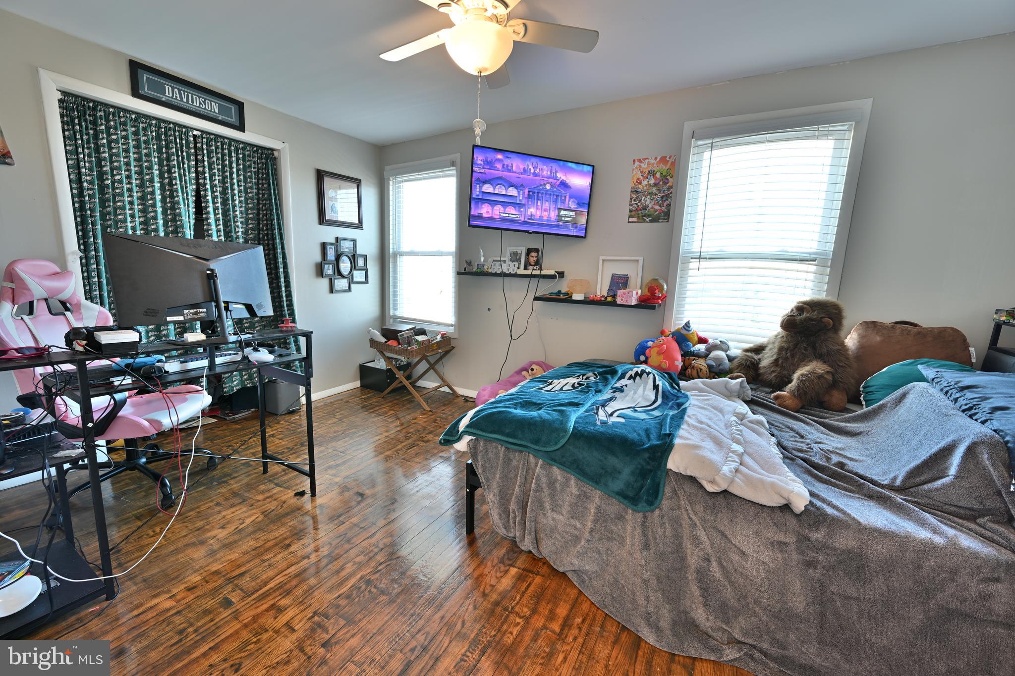 24734 East Main Street Columbus, NJ 08022 - Photo 15 of 24 a bedroom with furniture and a wooden floor