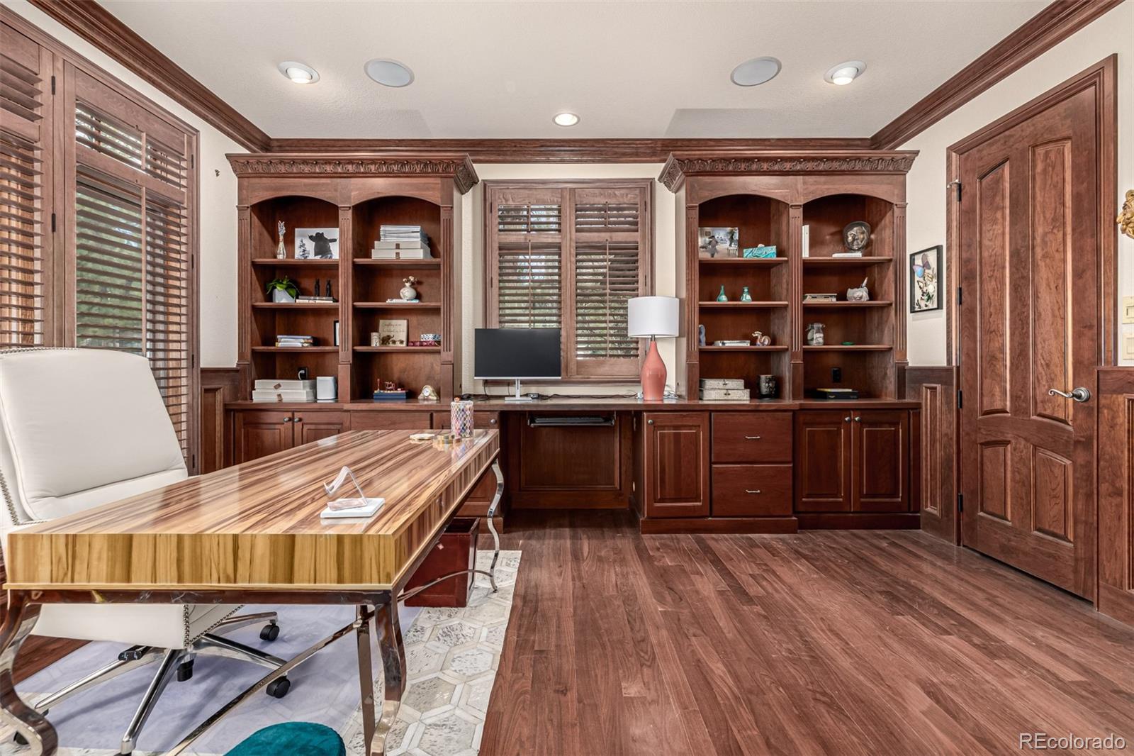 648 Ruby Trust Drive Castle Rock, CO 80108 - Photo 19 of 49 a open kitchen with stainless steel appliances granite countertop a stove and a refrigerator