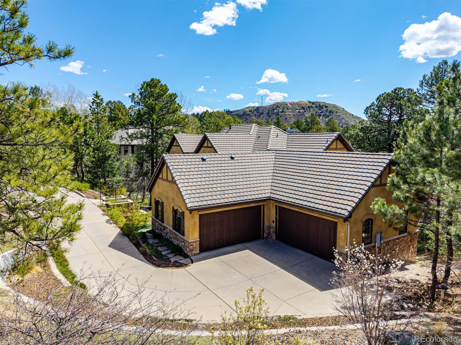 648 Ruby Trust Drive Castle Rock, CO 80108 - Photo 3 of 49 a view of a house with a yard