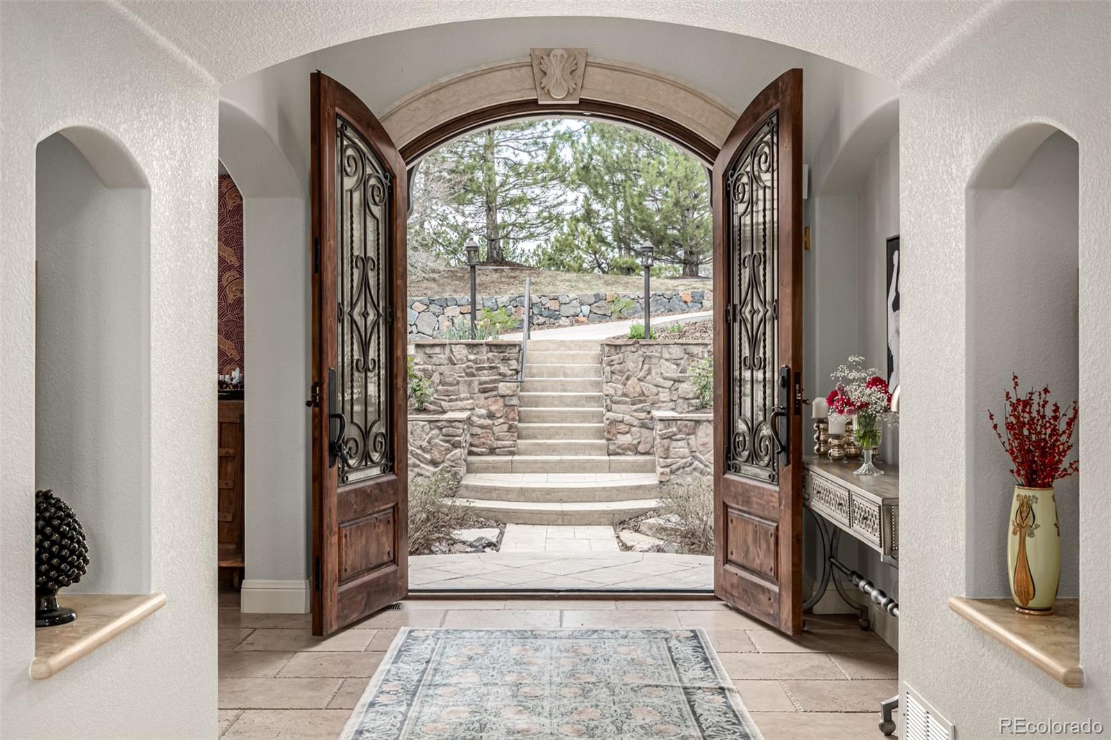 648 Ruby Trust Drive Castle Rock, CO 80108 - Photo 4 of 49 a view of a entryway door of the house