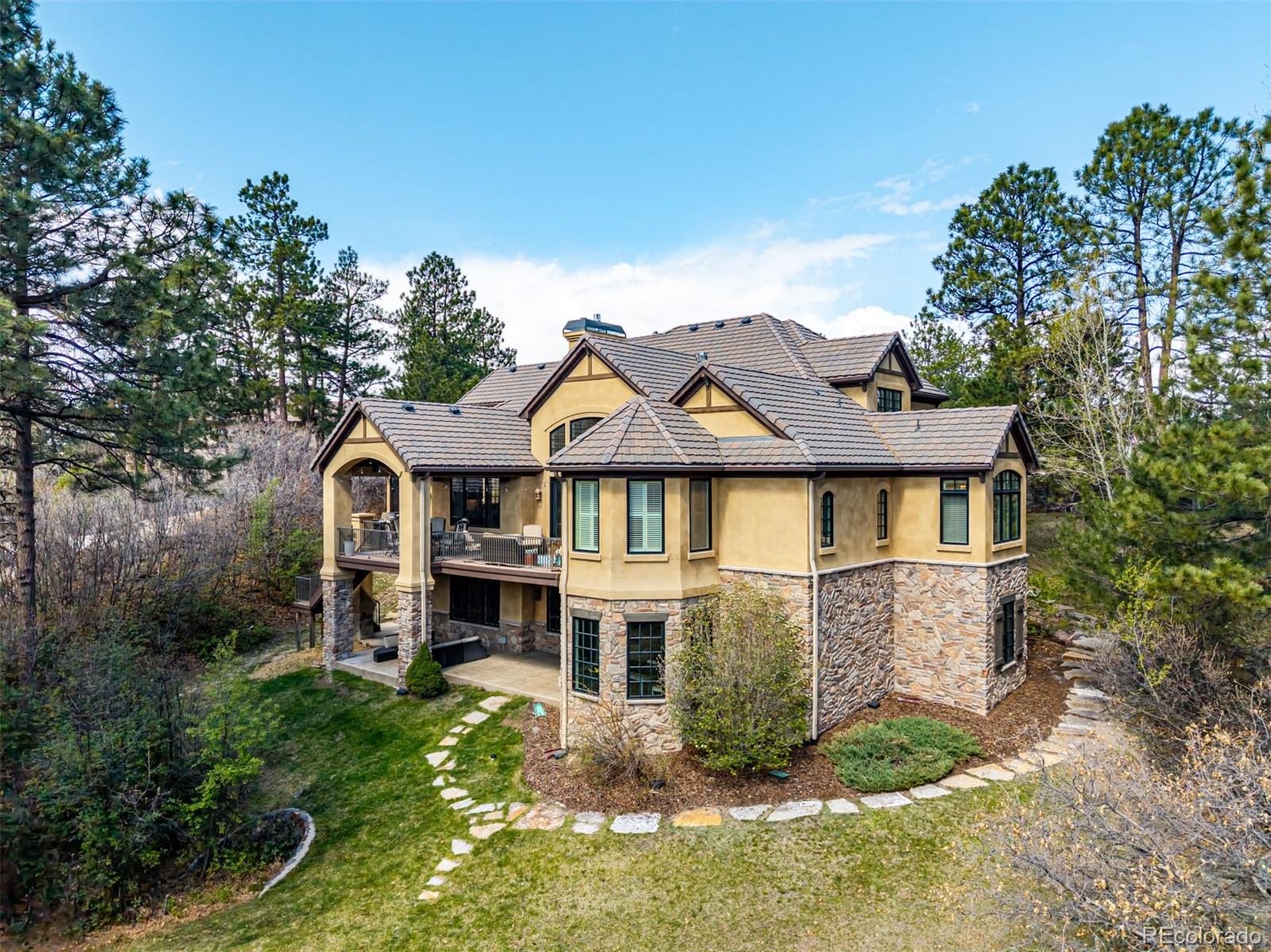 648 Ruby Trust Drive Castle Rock, CO 80108 - Photo 48 of 49 a front view of a house with a yard