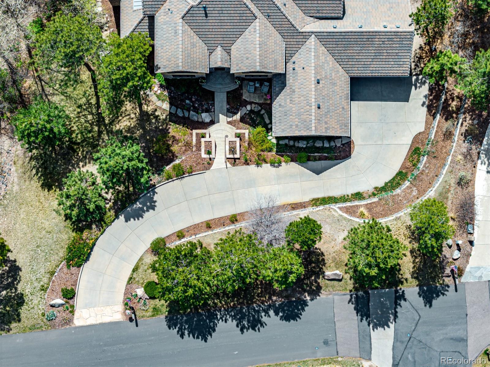 648 Ruby Trust Drive Castle Rock, CO 80108 - Photo 49 of 49 an aerial view of a house with a yard garden