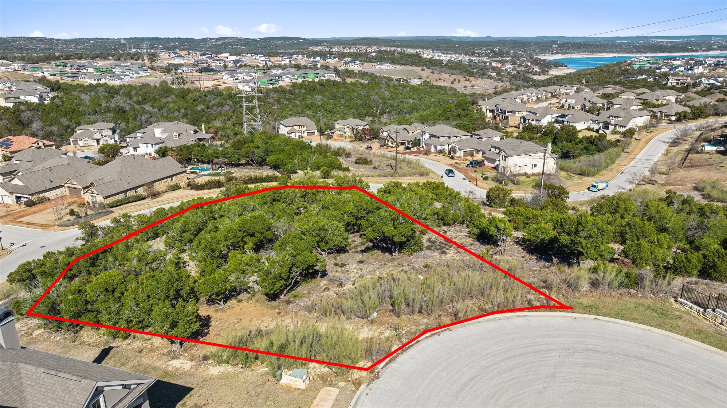 420 Lindale Cove Austin, TX 78738 - Photo 4 of 12 an aerial view of residential houses with outdoor space