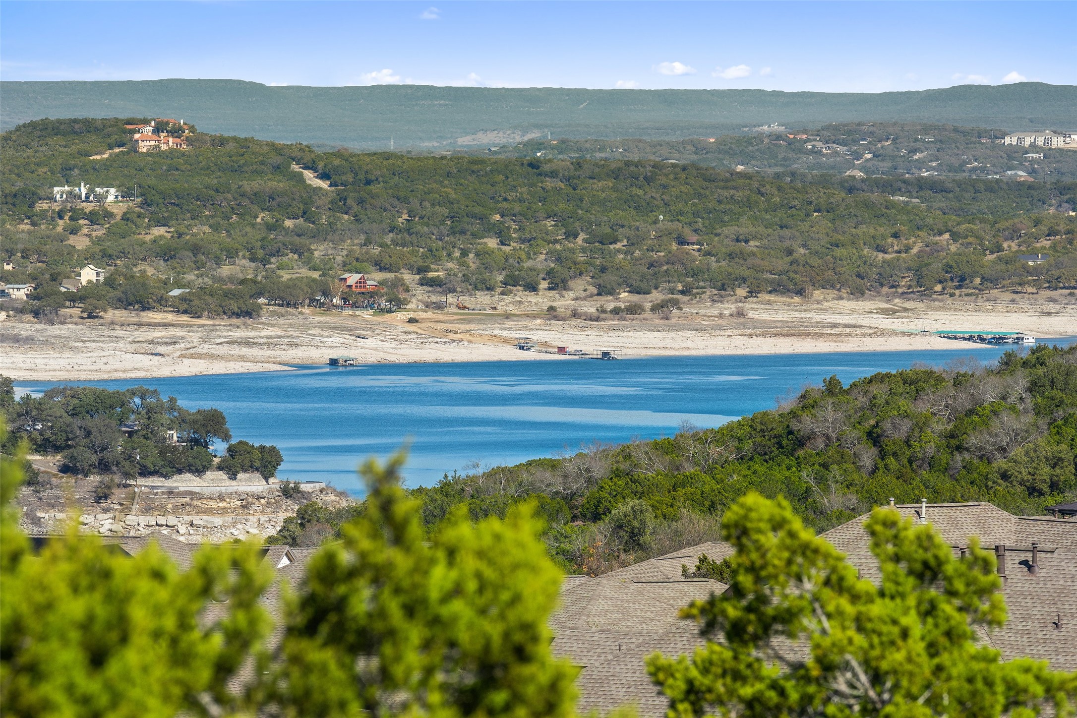 420 Lindale Cove Austin, TX 78738 - Photo 6 of 12 a view of a lake with a mountain