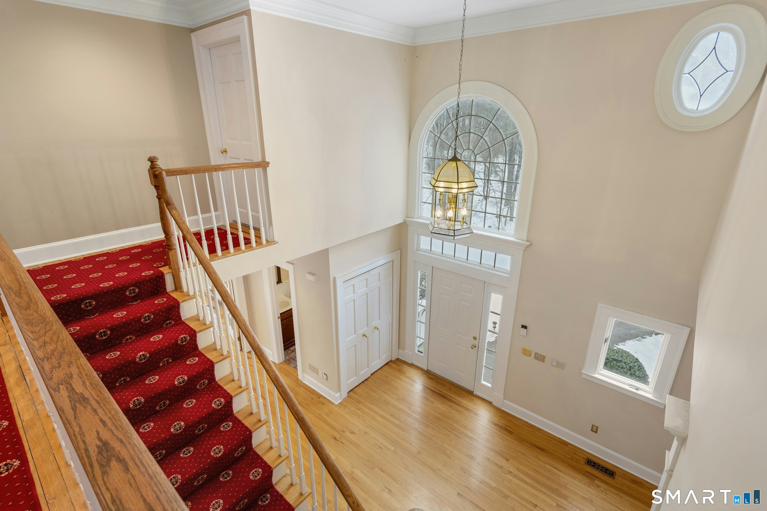 6 Morganti Court Ridgefield, CT 06877 - Photo 16 of 36 a view of entryway with wooden floor