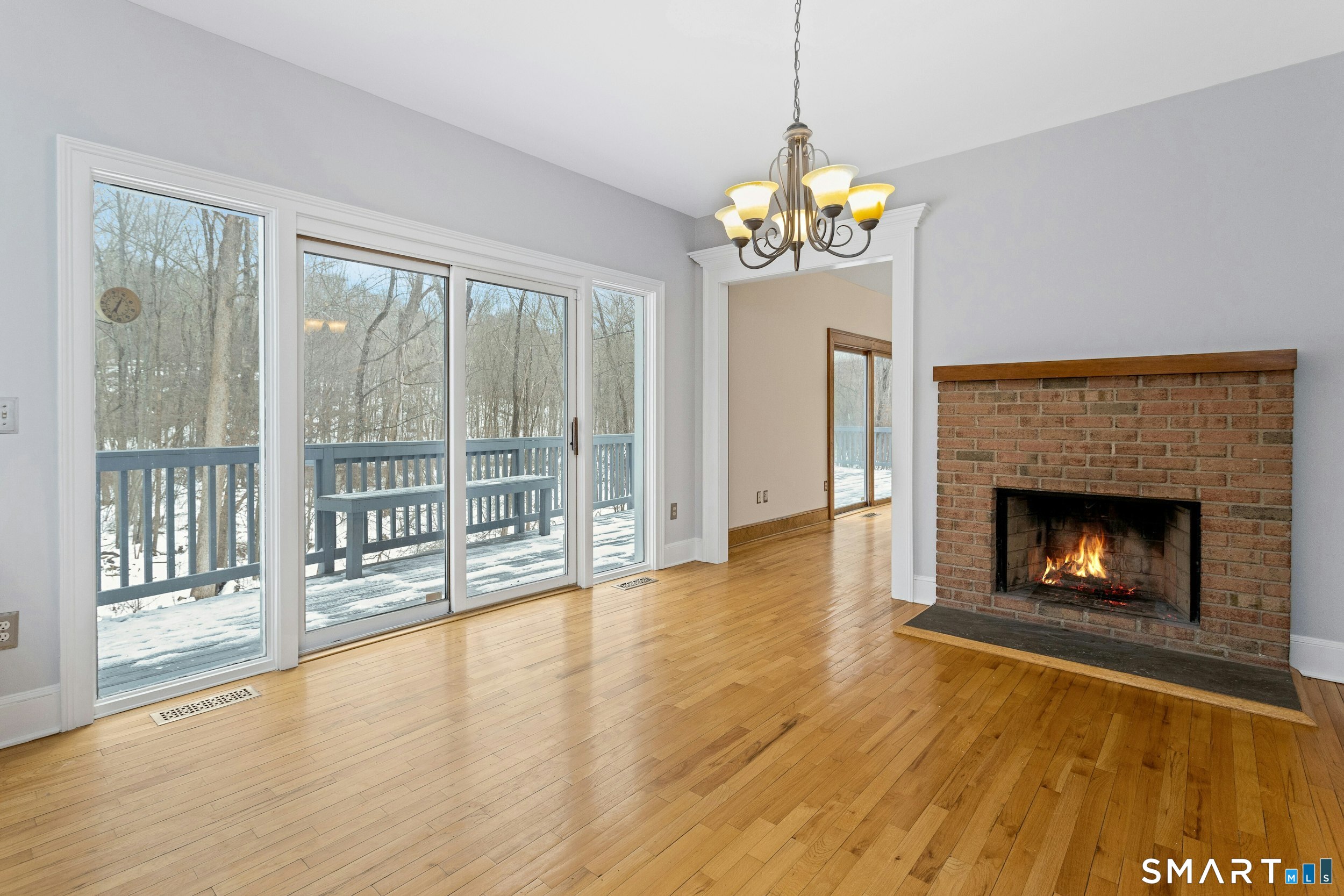 6 Morganti Court Ridgefield, CT 06877 - Photo 20 of 36 a view of an empty room with a fireplace and a window