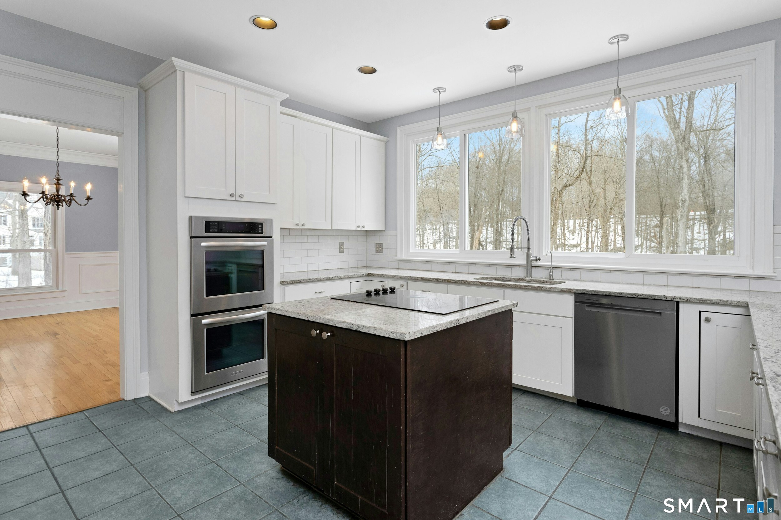 6 Morganti Court Ridgefield, CT 06877 - Photo 29 of 36 a kitchen with granite countertop a sink stove and refrigerator