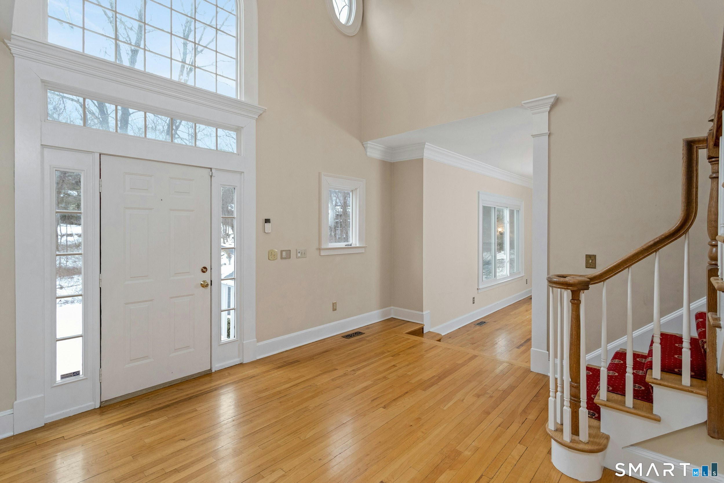6 Morganti Court Ridgefield, CT 06877 - Photo 4 of 36 a view of an entryway with wooden floor