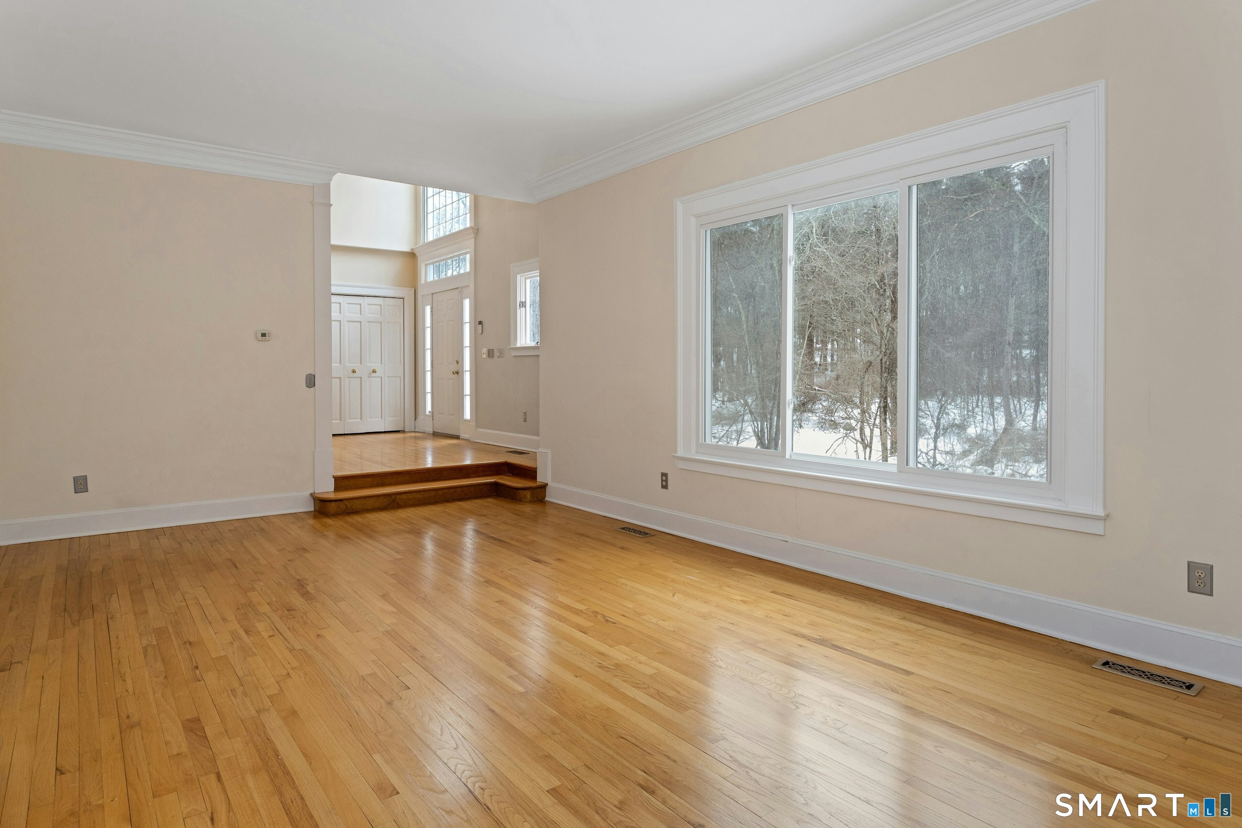6 Morganti Court Ridgefield, CT 06877 - Photo 6 of 36 a view of a room with wooden floor and window