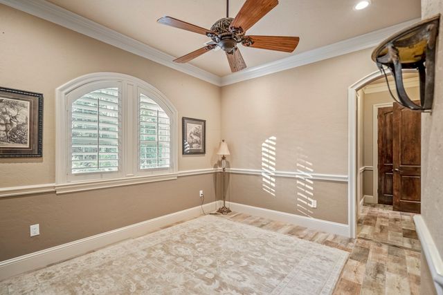 a living room with lots of furniture and a rug