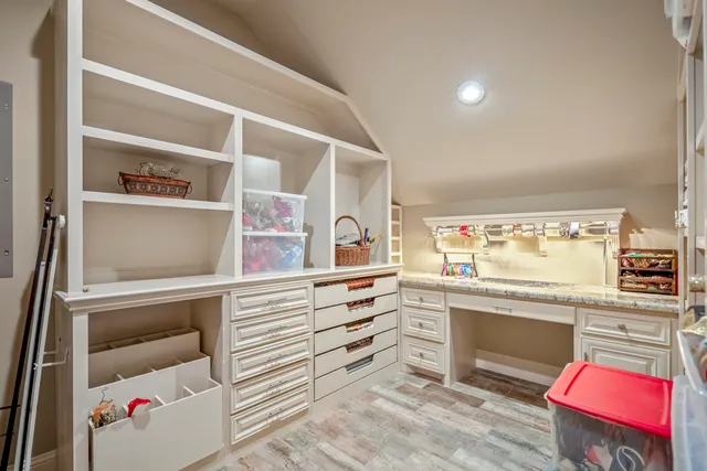 a bathroom with a sink vanity granite and toilet