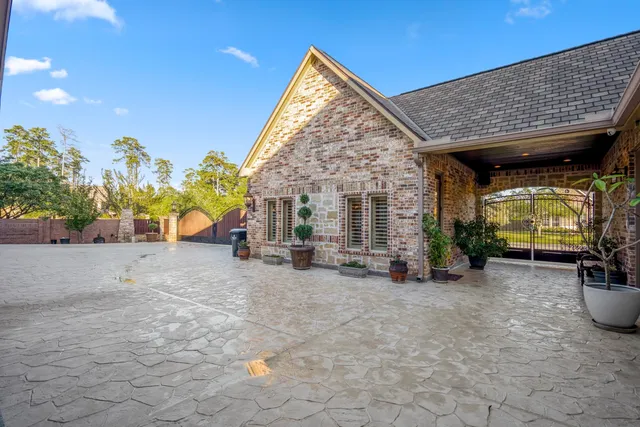 a bedroom with furniture and a flat screen tv