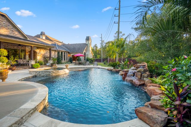 a view of pool with outdoor seating