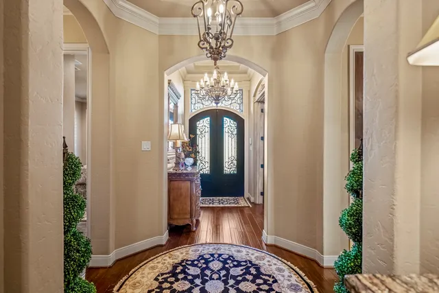 a kitchen with stainless steel appliances granite countertop a stove and a refrigerator