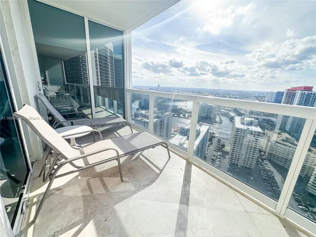 a living room with a couch and a flat screen tv