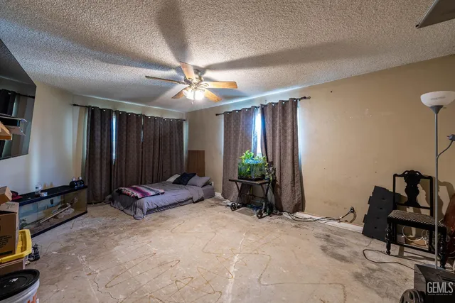 a view of a livingroom with furniture and a window