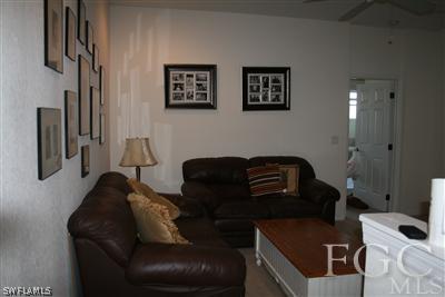 20244 Larino Loop Estero, FL 33928 - Photo 7 of 10 a living room with furniture