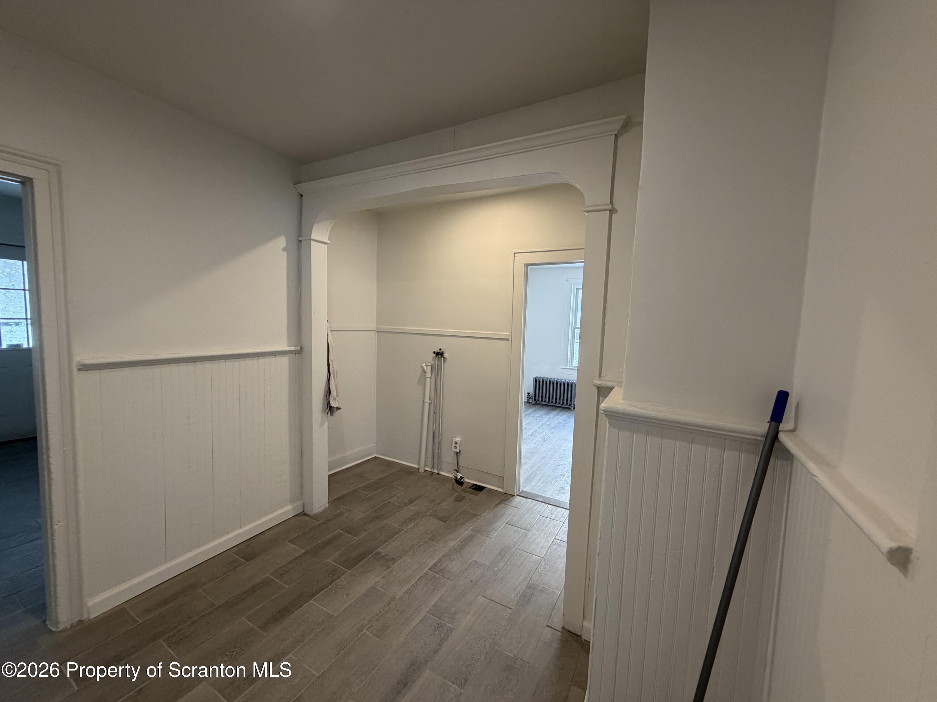 101 Clarkson Street, Unit 1 Jessup, PA 18434 - Photo 10 of 13 a view of small space with wooden floor