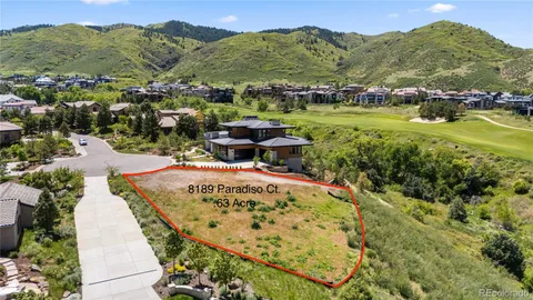 an aerial view of a house with a garden