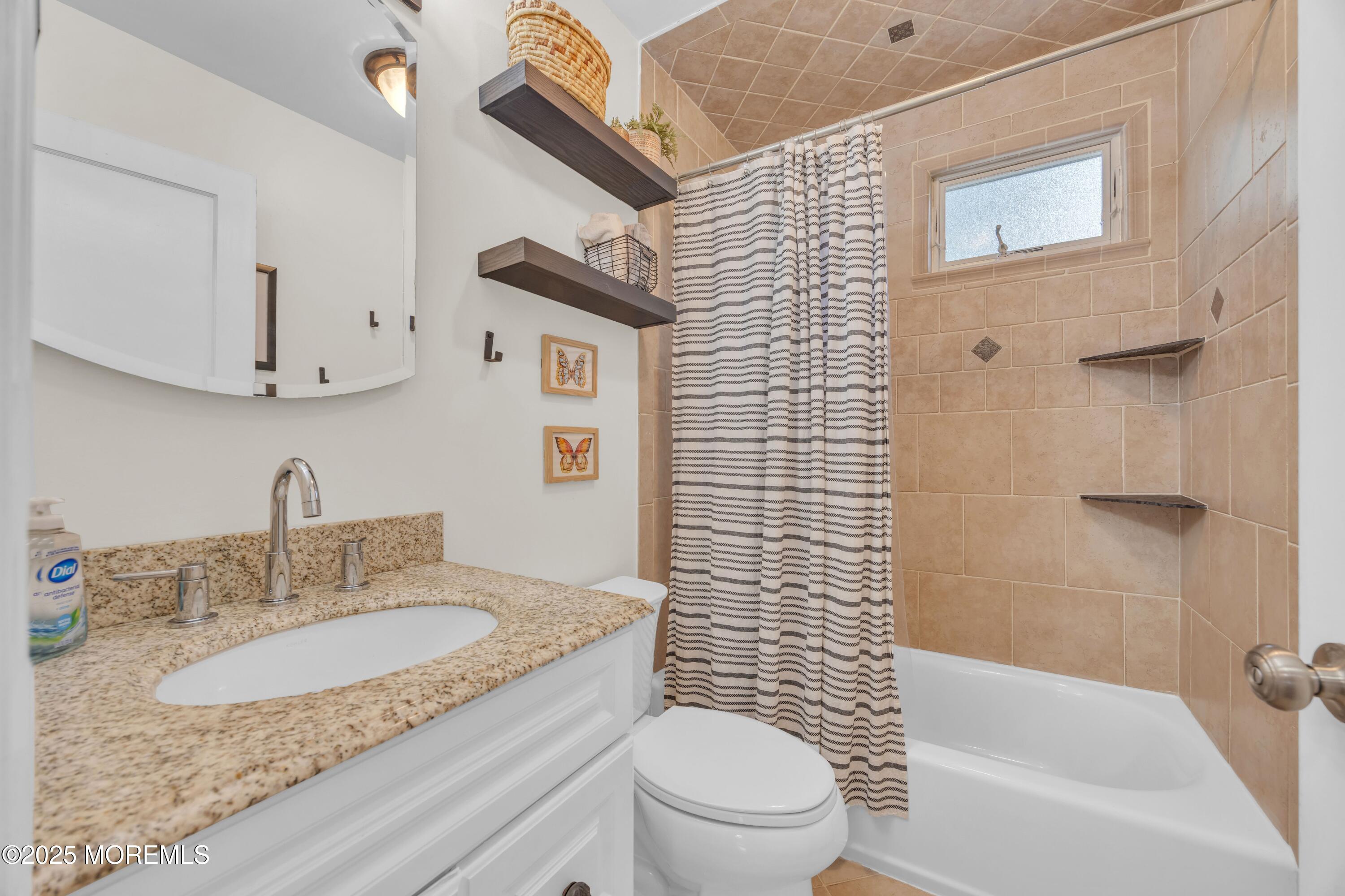 75 Ridgewood Road Clifton, NJ 07012 - Photo 13 of 41 a bathroom with a granite countertop sink toilet and shower
