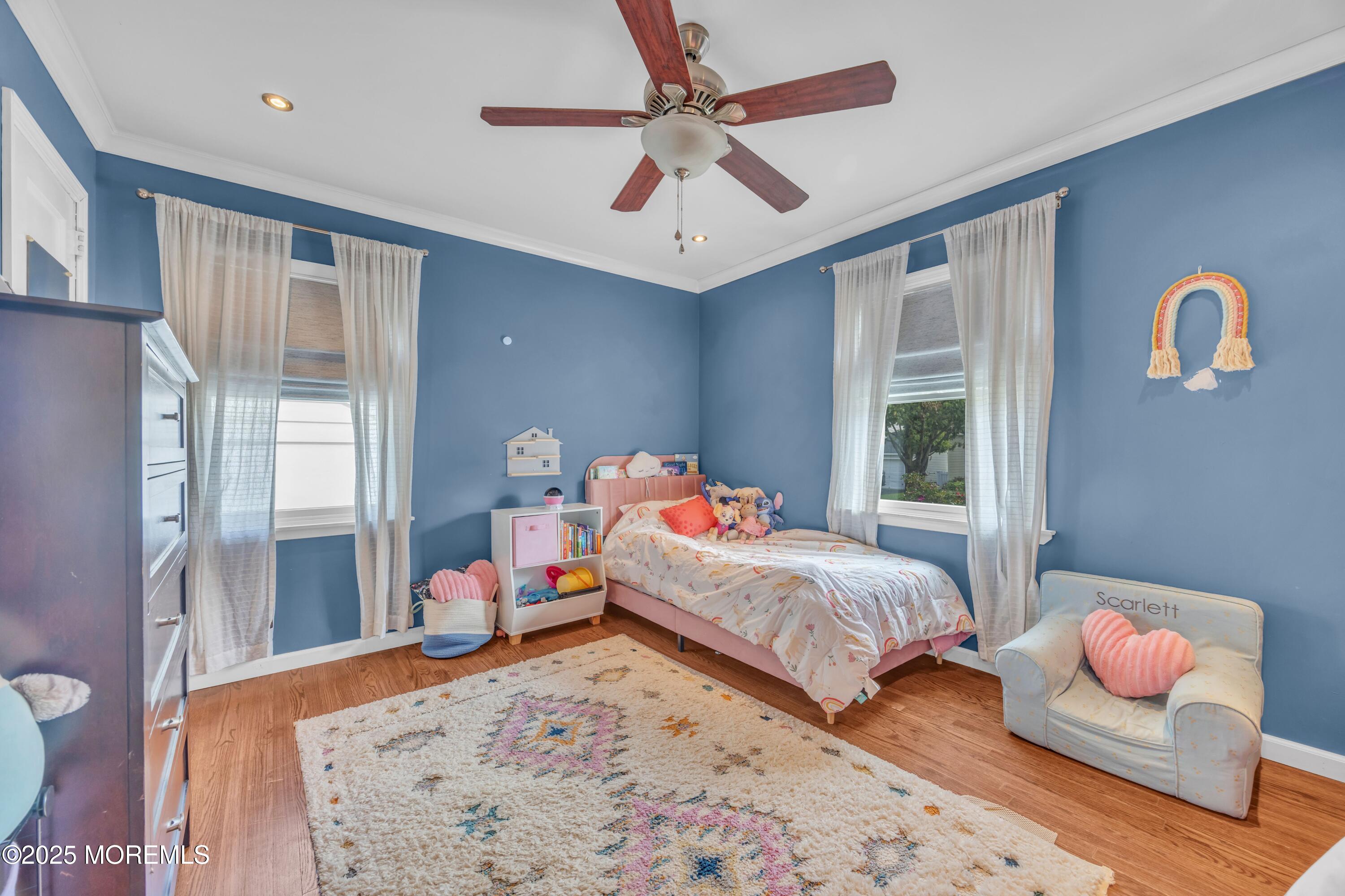75 Ridgewood Road Clifton, NJ 07012 - Photo 14 of 41 a bedroom with two beds and a chandelier