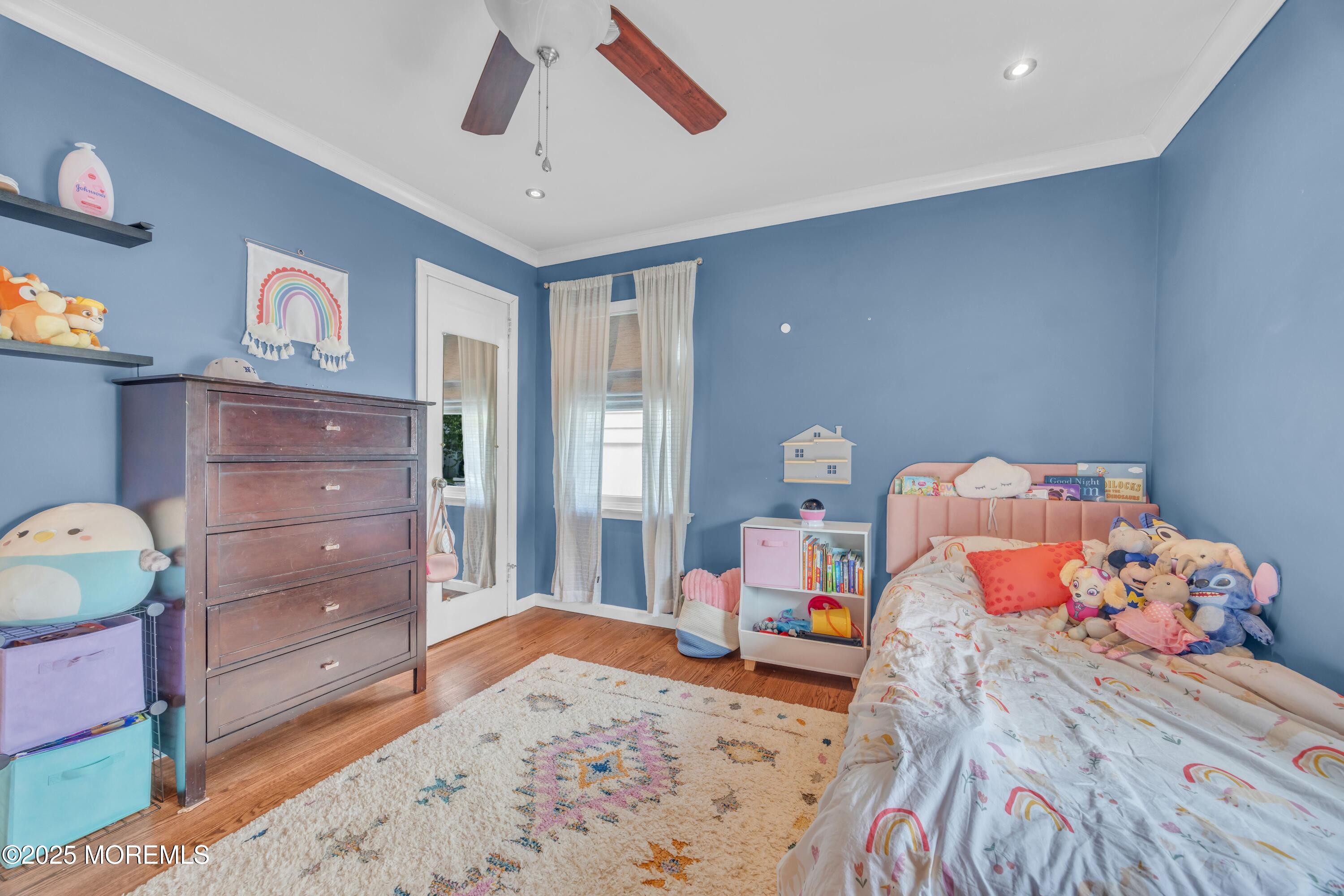 75 Ridgewood Road Clifton, NJ 07012 - Photo 15 of 41 a bedroom with a bed and wooden floor