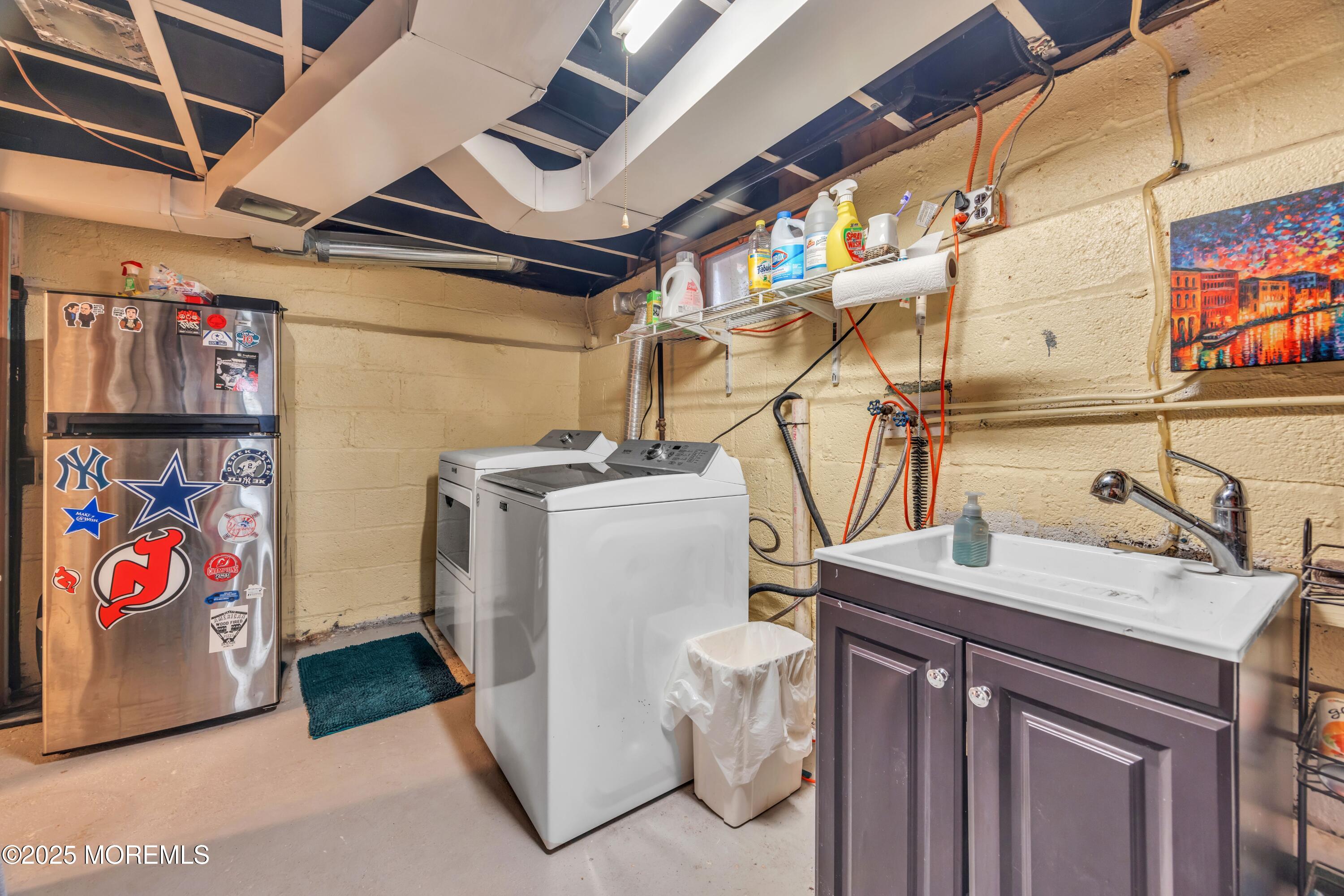 75 Ridgewood Road Clifton, NJ 07012 - Photo 24 of 41 a utility room with dryer and washer