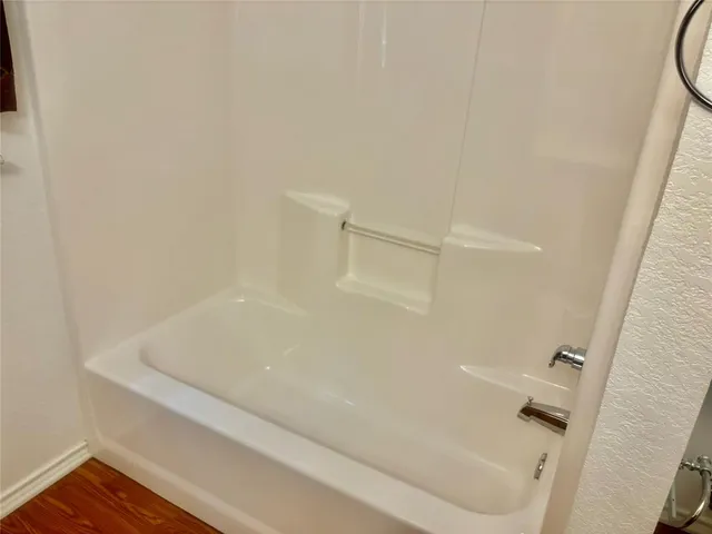 a bathroom with a bathtub