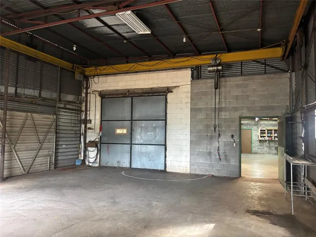 a view of a room with wooden wall