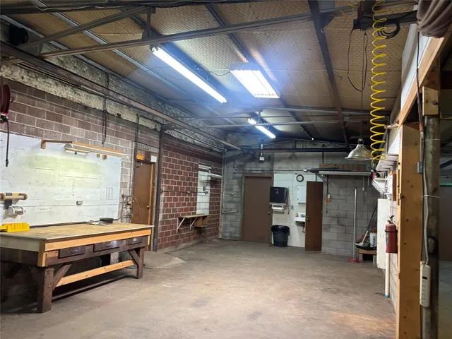 a room with furniture and a garage