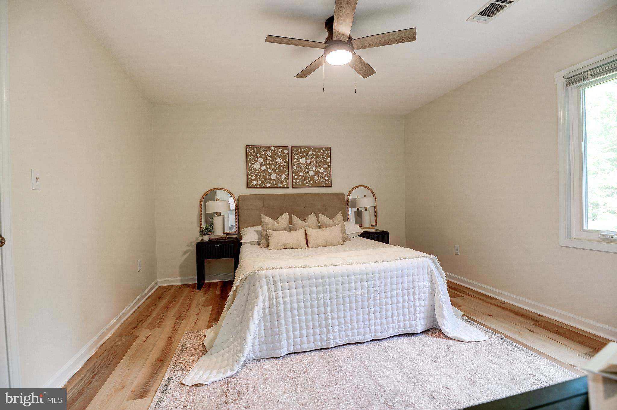 10116 Evans Ford Road Manassas, VA 20111 - Photo 28 of 63 a bedroom with a bed and a window