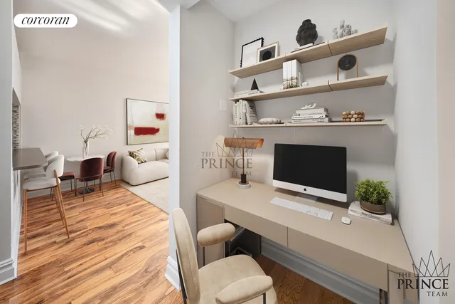 a kitchen with stainless steel appliances a stove a microwave and cabinets