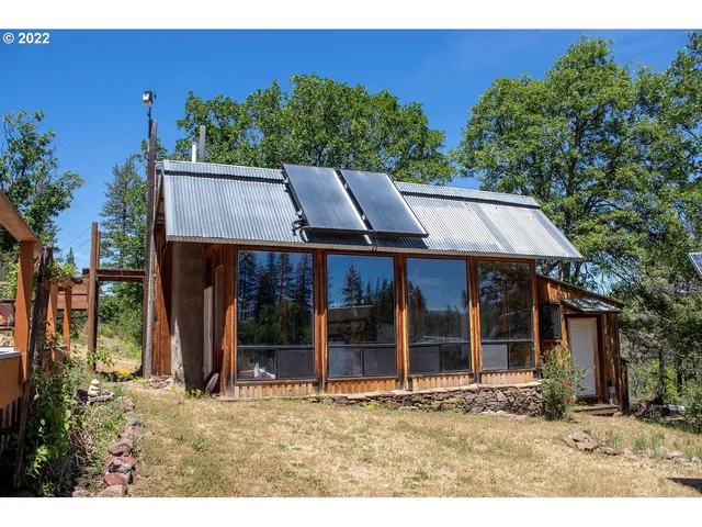 a view of balcony with furniture