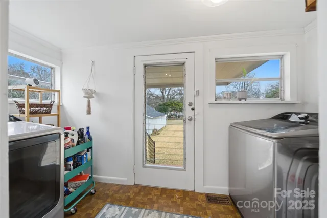 a bed room with a bed and a window