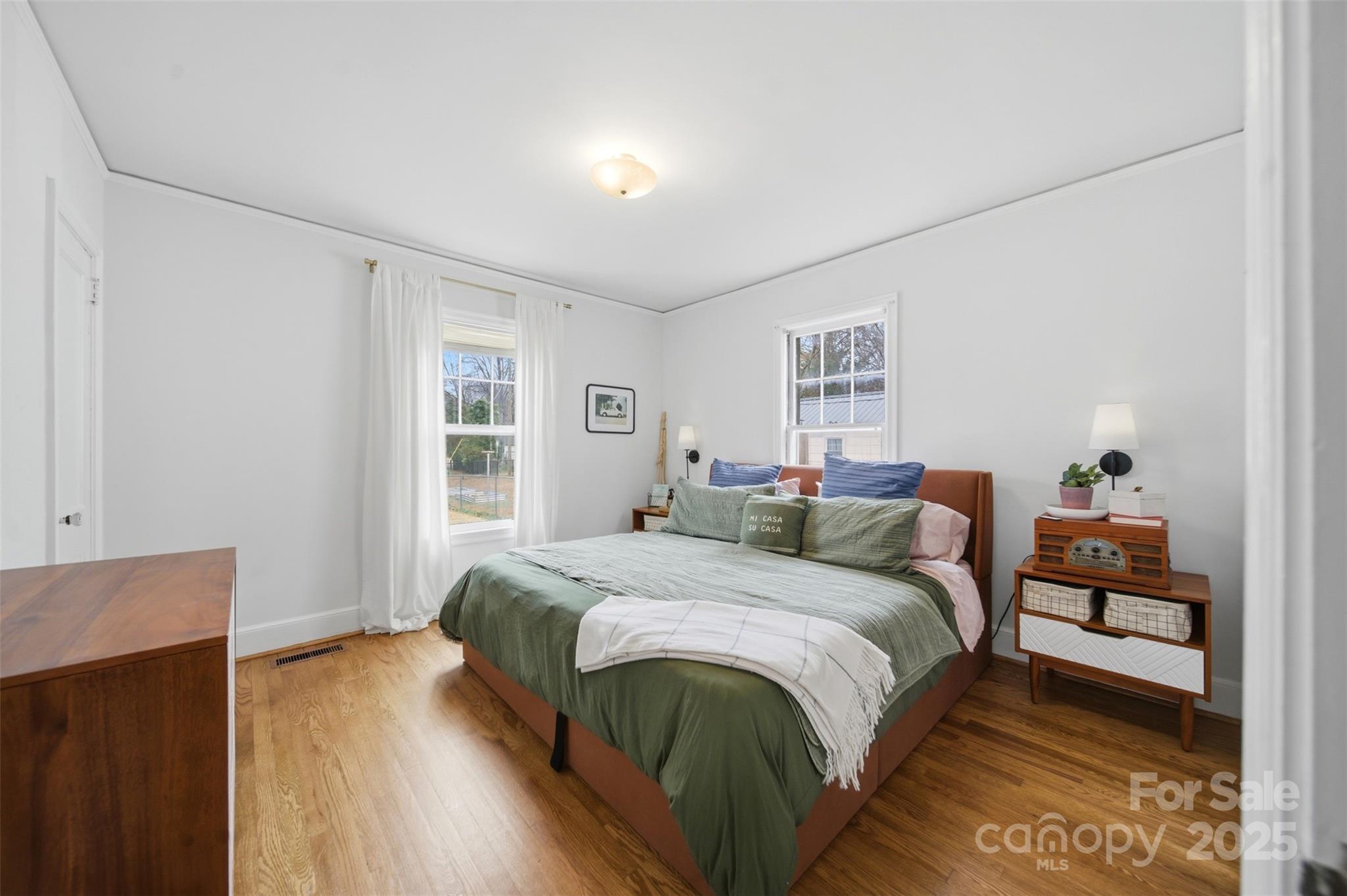 441 Jackson Street Rock Hill, SC 29730 - Photo 18 of 30 a bedroom with a bed and a night stand