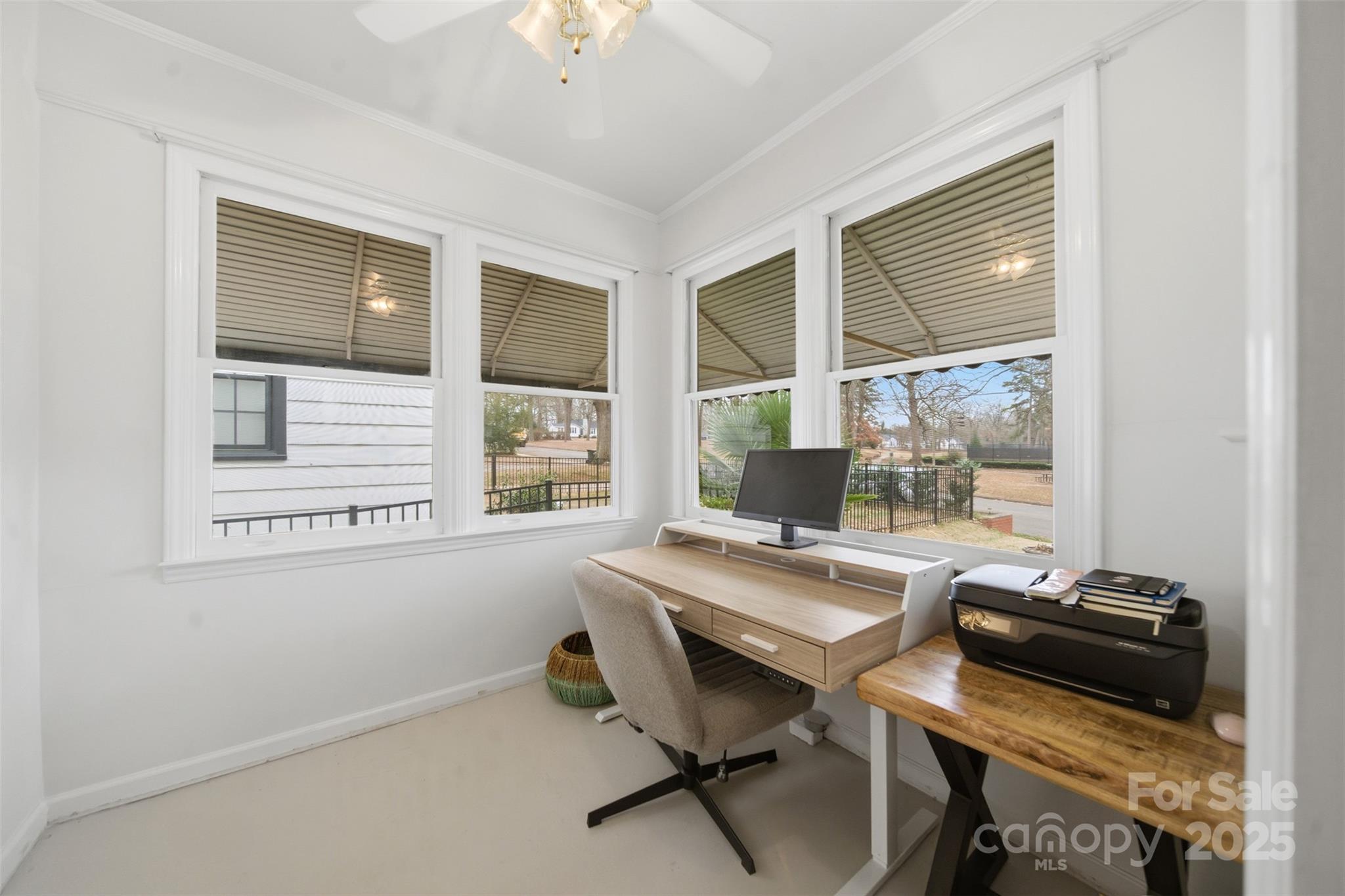 441 Jackson Street Rock Hill, SC 29730 - Photo 6 of 30 a view of a workspace with furniture and a window